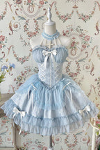 Inspired by the serene beauty of a summer sky meeting the sea, this dress captures the essence of effortless elegance. The strapless halter neckline offers a modern yet romantic silhouette, while layered ruffles and delicate bows create movement and playfulness. Crafted in a soothing blue hue, it blends sweetness with sophistication—perfect for the dreamer who finds magic in both sunlight and starlight.