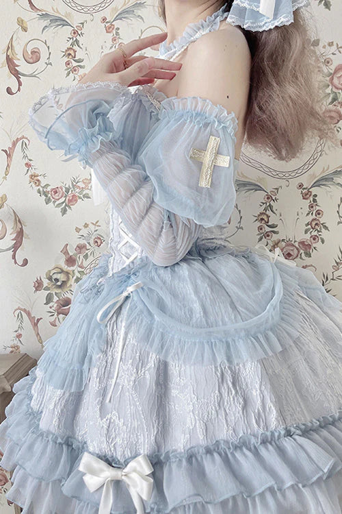 Inspired by the serene beauty of a summer sky meeting the sea, this dress captures the essence of effortless elegance. The strapless halter neckline offers a modern yet romantic silhouette, while layered ruffles and delicate bows create movement and playfulness. Crafted in a soothing blue hue, it blends sweetness with sophistication—perfect for the dreamer who finds magic in both sunlight and starlight.