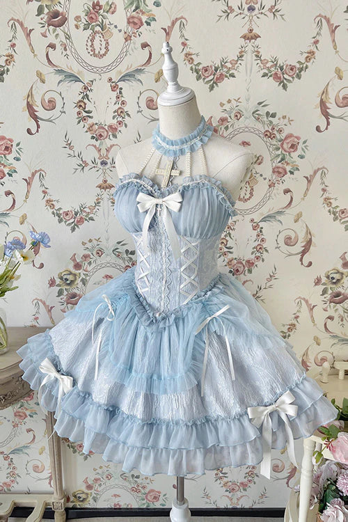 Inspired by the serene beauty of a summer sky meeting the sea, this dress captures the essence of effortless elegance. The strapless halter neckline offers a modern yet romantic silhouette, while layered ruffles and delicate bows create movement and playfulness. Crafted in a soothing blue hue, it blends sweetness with sophistication—perfect for the dreamer who finds magic in both sunlight and starlight.