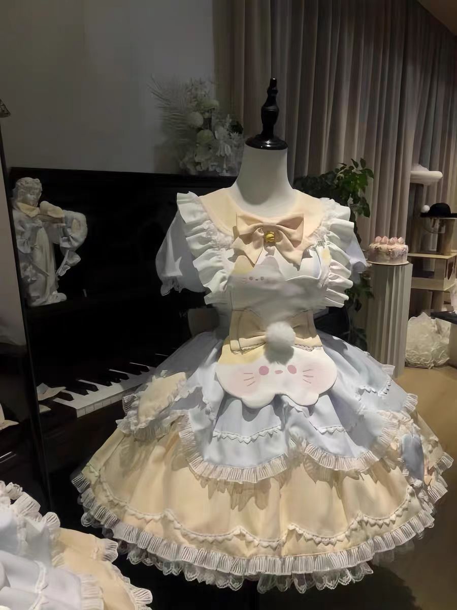 The Cute Sweet Lolita Apron Dress Set is designed to showcase softness and playful charm. Featuring a lace puff dress adorned with delicate bows, it creates a dreamy silhouette full of girlish sweetness. The kitten-themed apron adds a whimsical and cozy touch, making the outfit both unique and adorable. Perfect for tea parties, photoshoots, or casual gatherings, this set captures the essence of soft, cute Lolita fashion with comfort and elegance.