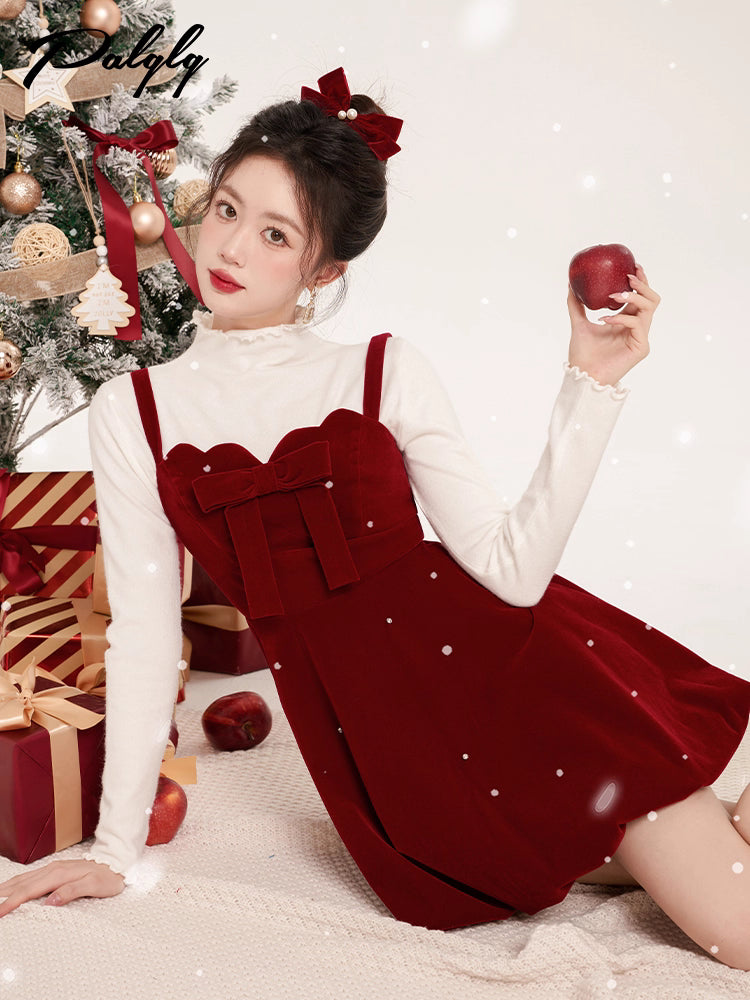 Inspired by the elegance of French luxury and winter opulence, this dress combines plush velvet with a dramatic A-line silhouette. The delicate butterfly clip detail adds a touch of whimsy, while the rich black and red palette exudes sophistication. Designed to blend timeless romance with modern princess charm, it creates a striking statement for winter celebrations.