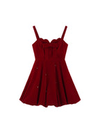 Inspired by the elegance of French luxury and winter opulence, this dress combines plush velvet with a dramatic A-line silhouette. The delicate butterfly clip detail adds a touch of whimsy, while the rich black and red palette exudes sophistication. Designed to blend timeless romance with modern princess charm, it creates a striking statement for winter celebrations.