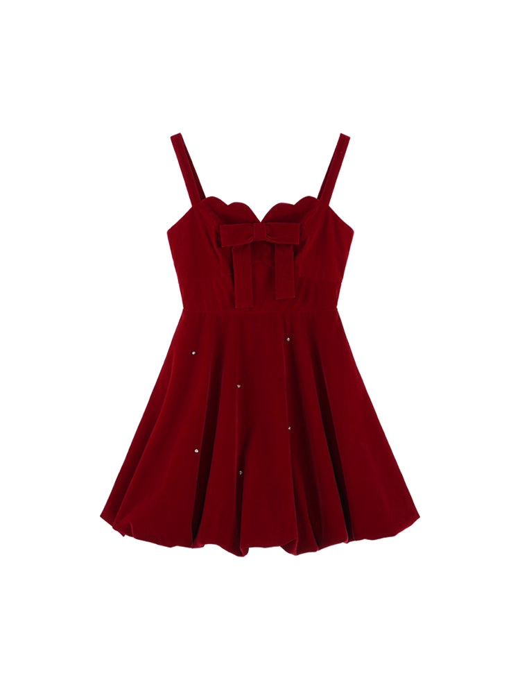 Inspired by the elegance of French luxury and winter opulence, this dress combines plush velvet with a dramatic A-line silhouette. The delicate butterfly clip detail adds a touch of whimsy, while the rich black and red palette exudes sophistication. Designed to blend timeless romance with modern princess charm, it creates a striking statement for winter celebrations.