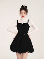 Inspired by the elegance of French luxury and winter opulence, this dress combines plush velvet with a dramatic A-line silhouette. The delicate butterfly clip detail adds a touch of whimsy, while the rich black and red palette exudes sophistication. Designed to blend timeless romance with modern princess charm, it creates a striking statement for winter celebrations.