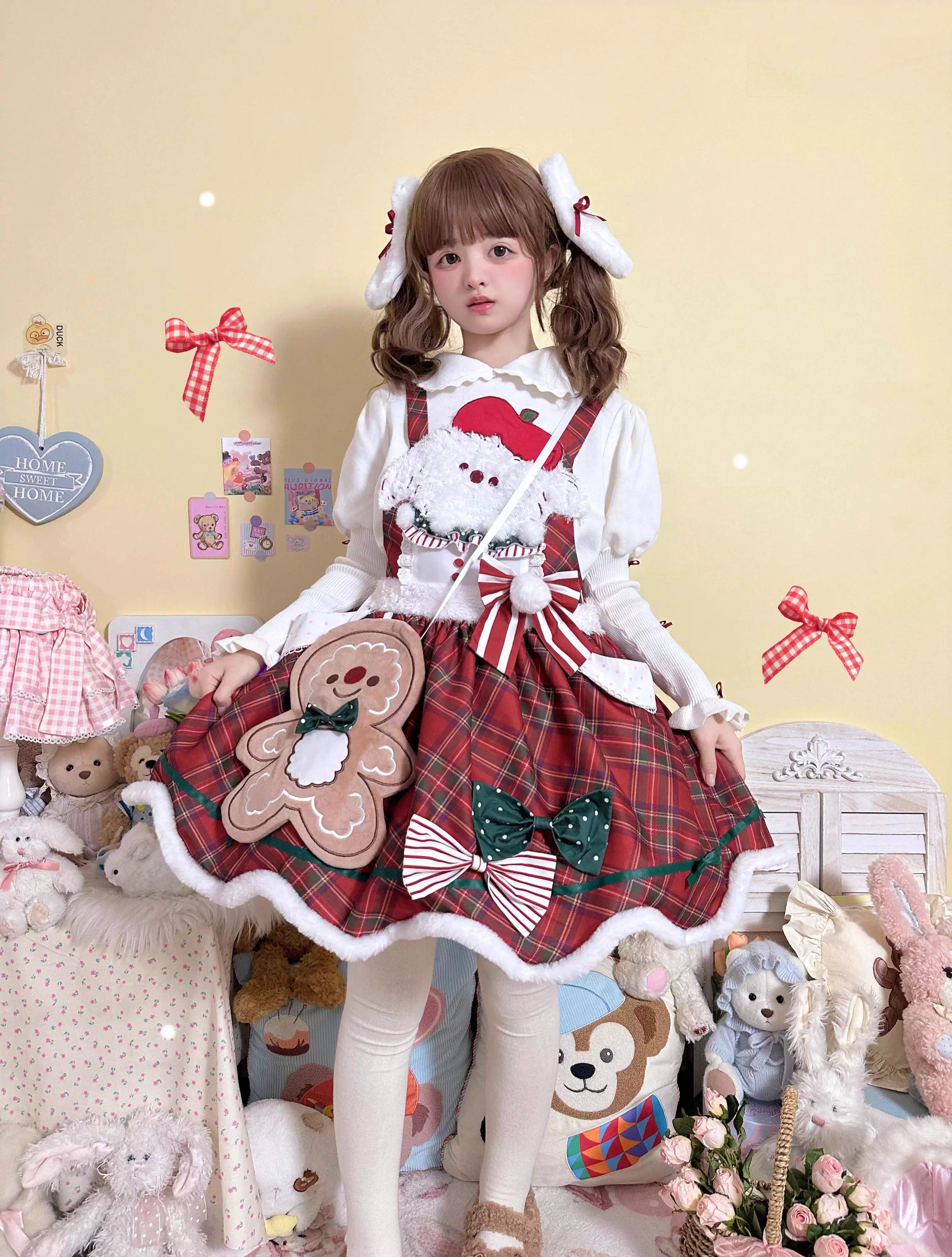 Inspired by the warmth of a Christmas puppy, this original design blends cozy plaid fabric with playful Lolita details. The festive color palette and whimsical motifs evoke holiday cheer, while the classic A-line cut ensures a flattering silhouette. Perfect for winter gatherings, it combines comfort and charm for a truly adorable seasonal style.