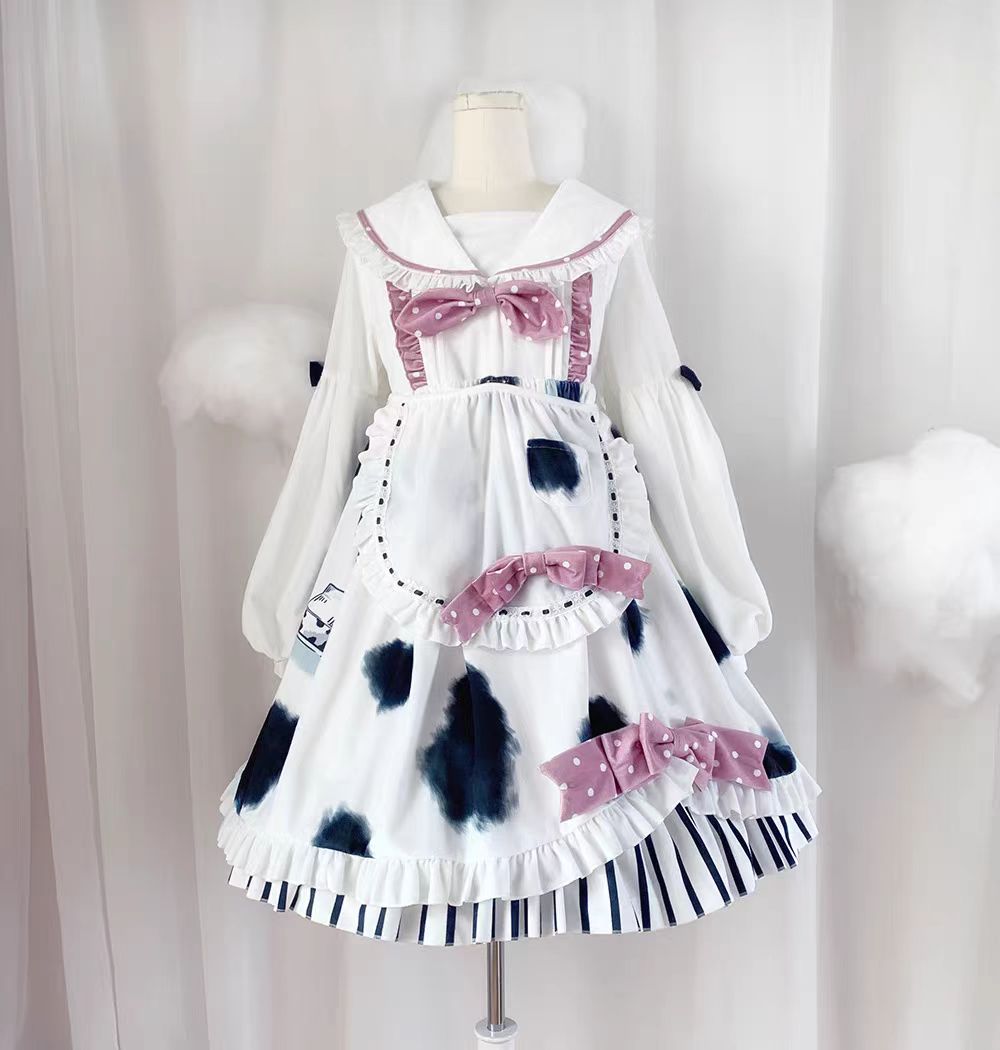 The Cow Print Sweet Lolita Dress combines playful charm with classic elegance. Featuring a doll collar and lantern sleeves, it creates a vintage-inspired silhouette, while the ruffled details and bowknot accents add sweetness. The unique cow print stitching introduces a fun, eye-catching twist that balances cuteness with individuality. Perfect for casual outings, themed events, or tea parties, this dress reflects the whimsical, versatile spirit of Lolita fashion.