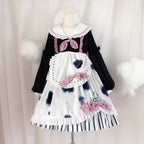 The Cow Print Sweet Lolita Dress combines playful charm with classic elegance. Featuring a doll collar and lantern sleeves, it creates a vintage-inspired silhouette, while the ruffled details and bowknot accents add sweetness. The unique cow print stitching introduces a fun, eye-catching twist that balances cuteness with individuality. Perfect for casual outings, themed events, or tea parties, this dress reflects the whimsical, versatile spirit of Lolita fashion.