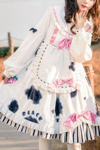 The Cow Print Sweet Lolita Dress combines playful charm with classic elegance. Featuring a doll collar and lantern sleeves, it creates a vintage-inspired silhouette, while the ruffled details and bowknot accents add sweetness. The unique cow print stitching introduces a fun, eye-catching twist that balances cuteness with individuality. Perfect for casual outings, themed events, or tea parties, this dress reflects the whimsical, versatile spirit of Lolita fashion.
