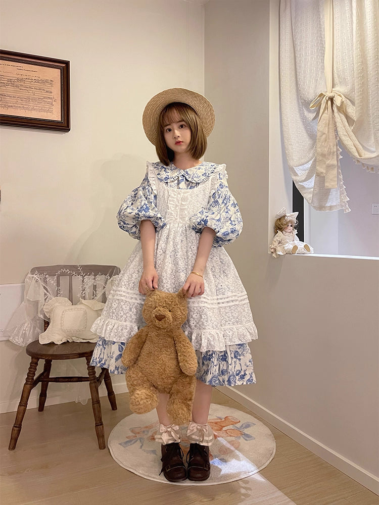Design Concept:
This Sweet Lolita dress features a delicate white floral overlay with a layered apron-style design, crafted for a soft and elegant silhouette. The mid-length cut and tie-up details at the waist create a flattering fit while maintaining a charming, playful aesthetic. Perfect for daily wear, tea parties, or casual Lolita gatherings, this dress combines classic Lolita sweetness with versatile everyday style.