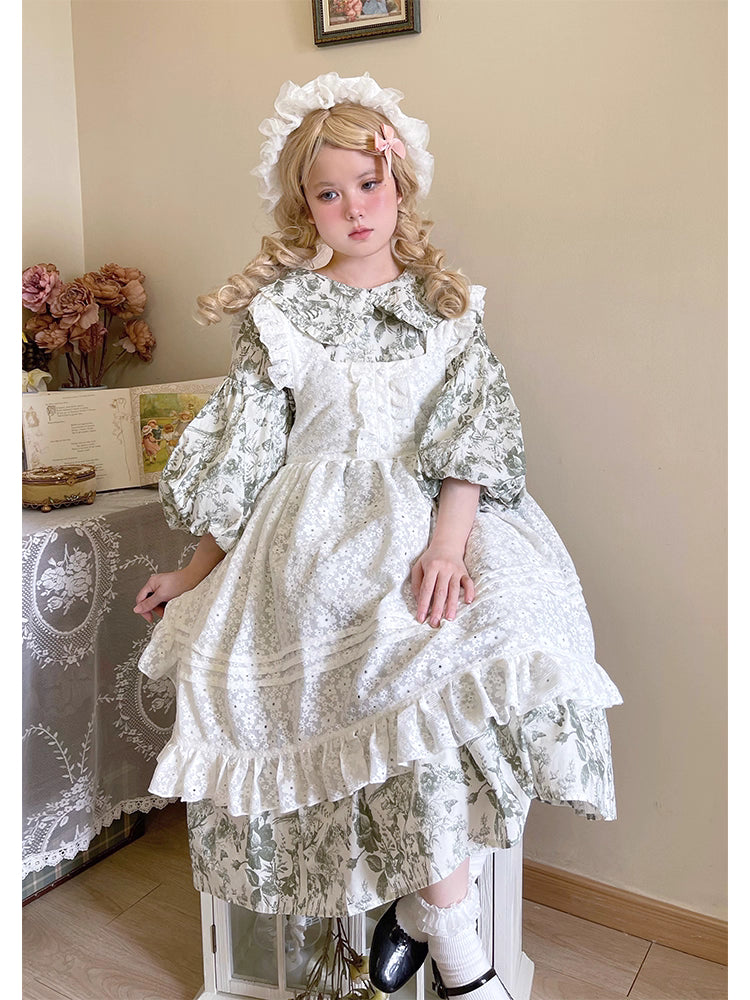 Design Concept:
This Sweet Lolita dress features a delicate white floral overlay with a layered apron-style design, crafted for a soft and elegant silhouette. The mid-length cut and tie-up details at the waist create a flattering fit while maintaining a charming, playful aesthetic. Perfect for daily wear, tea parties, or casual Lolita gatherings, this dress combines classic Lolita sweetness with versatile everyday style.