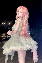 Crafted for the dreamer who dwells in enchanted forests, this Lolita dress embodies a whimsical fairy tale. The lush green floral print captures a secret garden in eternal bloom, while delicate lace and soft ruffles mimic dewy foliage and petals. A signature bow adds a touch of playful elegance. We designed this dress to be a wearable fantasy, empowering you to express your most magical and authentic self. Every stitch is an invitation to embrace wonder.