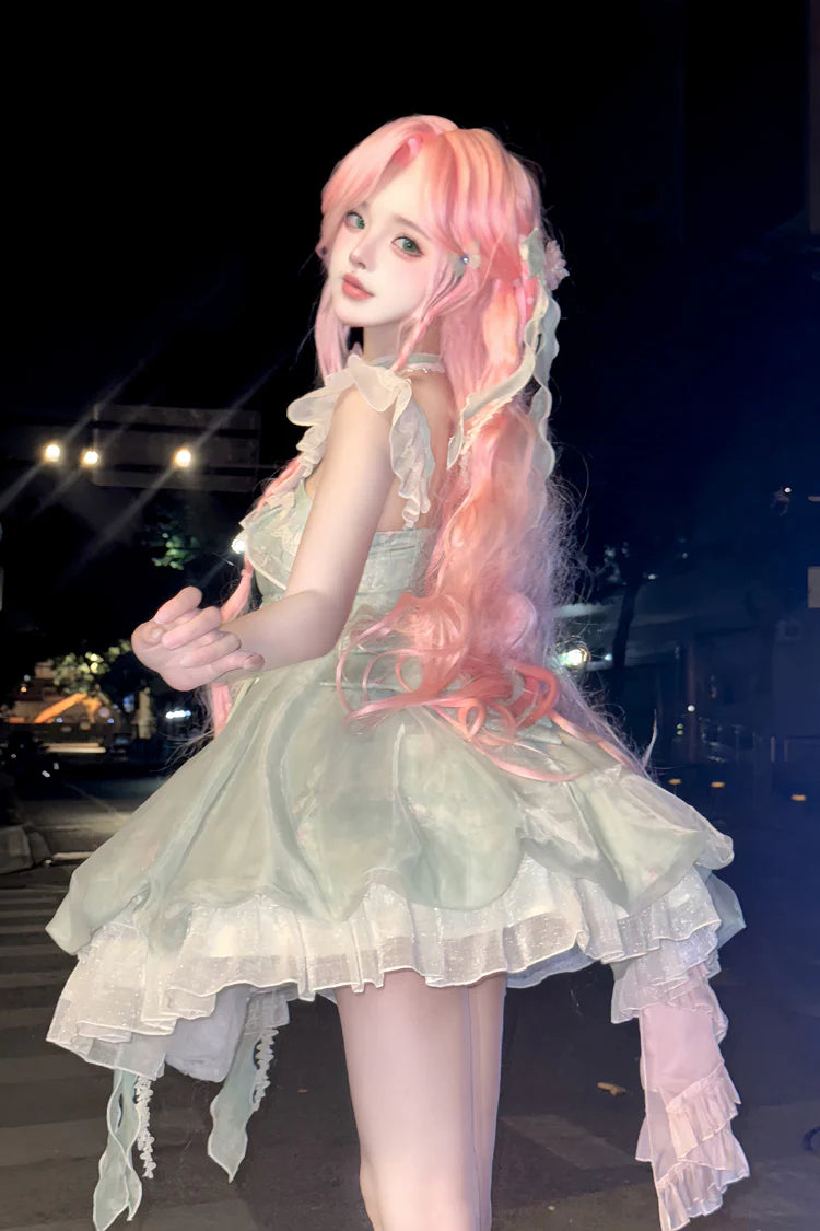 Crafted for the dreamer who dwells in enchanted forests, this Lolita dress embodies a whimsical fairy tale. The lush green floral print captures a secret garden in eternal bloom, while delicate lace and soft ruffles mimic dewy foliage and petals. A signature bow adds a touch of playful elegance. We designed this dress to be a wearable fantasy, empowering you to express your most magical and authentic self. Every stitch is an invitation to embrace wonder.