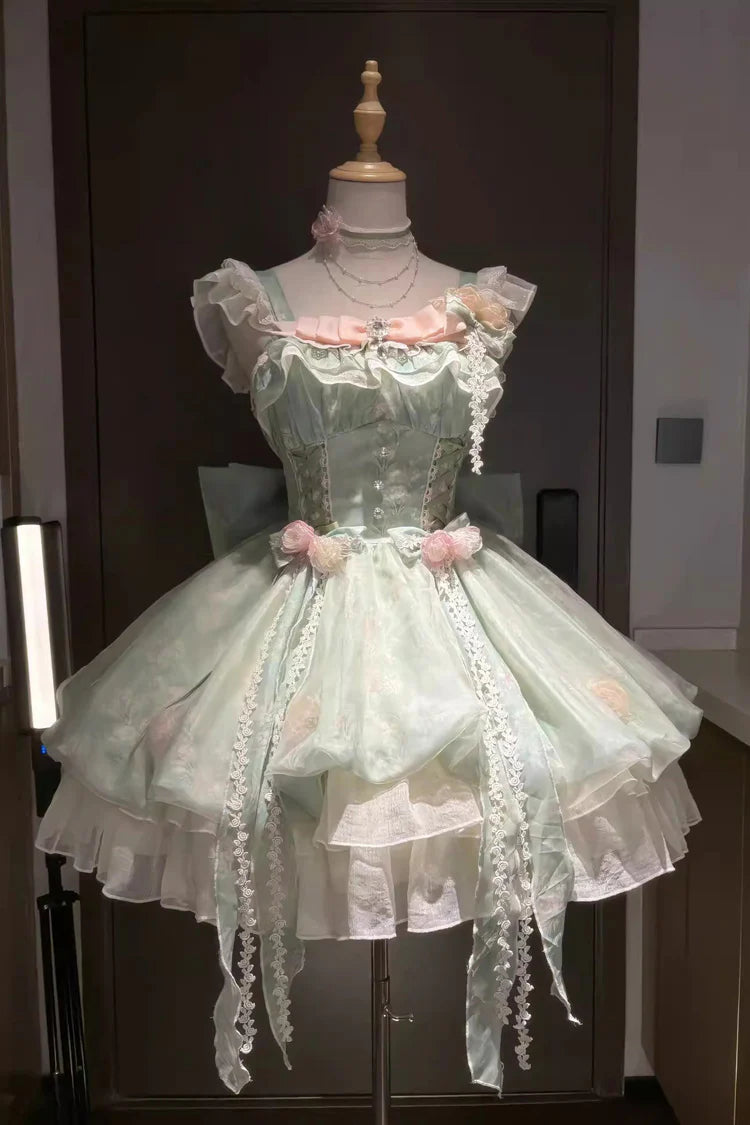 Crafted for the dreamer who dwells in enchanted forests, this Lolita dress embodies a whimsical fairy tale. The lush green floral print captures a secret garden in eternal bloom, while delicate lace and soft ruffles mimic dewy foliage and petals. A signature bow adds a touch of playful elegance. We designed this dress to be a wearable fantasy, empowering you to express your most magical and authentic self. Every stitch is an invitation to embrace wonder.