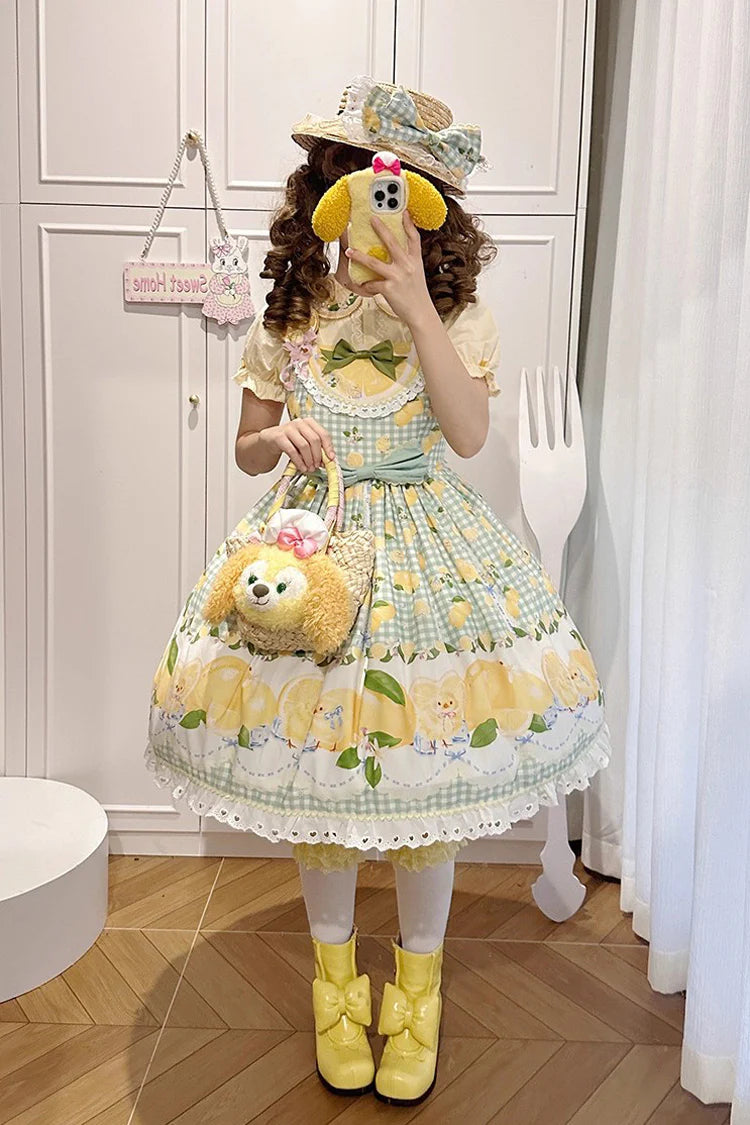 The Green Lemon Print JSK Dress brings freshness and charm to Sweet Lolita fashion. Adorned with playful lemon patterns, it captures a lively, summery vibe, while layered ruffles and delicate lace enhance its romantic silhouette. The bowknot accents add sweetness and detail, making the dress both youthful and elegant. Perfect for picnics, garden parties, or casual gatherings, it reflects the cheerful, whimsical spirit of Lolita style with a refreshing twist.