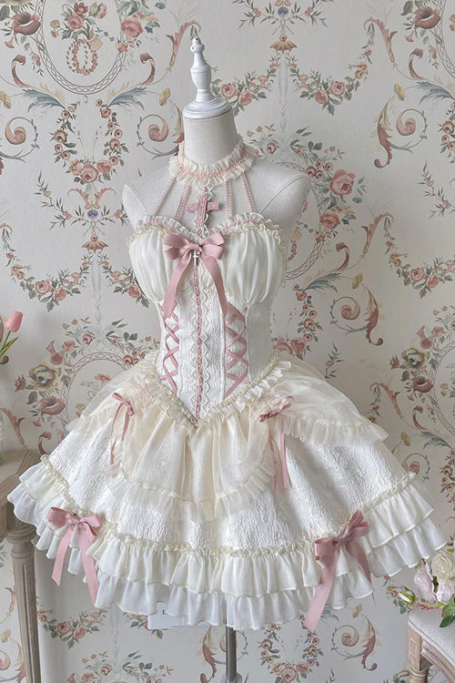 Evoking the delicate grace of a summer garden party, this dress blends timeless elegance with playful charm. The halter neckline and sleeveless design highlight feminine shoulders, while layers of lace ruffles and satin bows cascade like blooming petals. Crafted in a soft ivory-pink hue, it captures the essence of romance—inviting the wearer to step into a dream where sweetness and sophistication dance in perfect harmony.