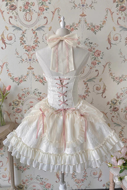 Evoking the delicate grace of a summer garden party, this dress blends timeless elegance with playful charm. The halter neckline and sleeveless design highlight feminine shoulders, while layers of lace ruffles and satin bows cascade like blooming petals. Crafted in a soft ivory-pink hue, it captures the essence of romance—inviting the wearer to step into a dream where sweetness and sophistication dance in perfect harmony.