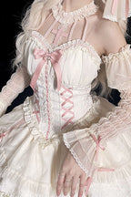 Evoking the delicate grace of a summer garden party, this dress blends timeless elegance with playful charm. The halter neckline and sleeveless design highlight feminine shoulders, while layers of lace ruffles and satin bows cascade like blooming petals. Crafted in a soft ivory-pink hue, it captures the essence of romance—inviting the wearer to step into a dream where sweetness and sophistication dance in perfect harmony.
