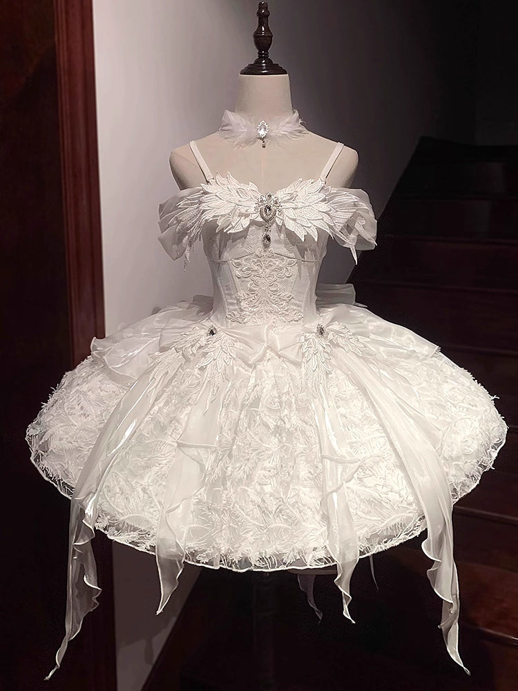 Inspired by the duality of modern femininity, this dress merges classic Lolita elegance with contemporary sophistication. The structured sweetheart bodice and voluminous skirt create a timeless silhouette, while the off-shoulder neckline adds a touch of delicate allure. Crafted in luxurious ivory with intricate lace detailing, it embodies both innocence and refinement. Ideal for moments where fantasy meets reality—perfect for the dreamer who commands grace with quiet confidence.