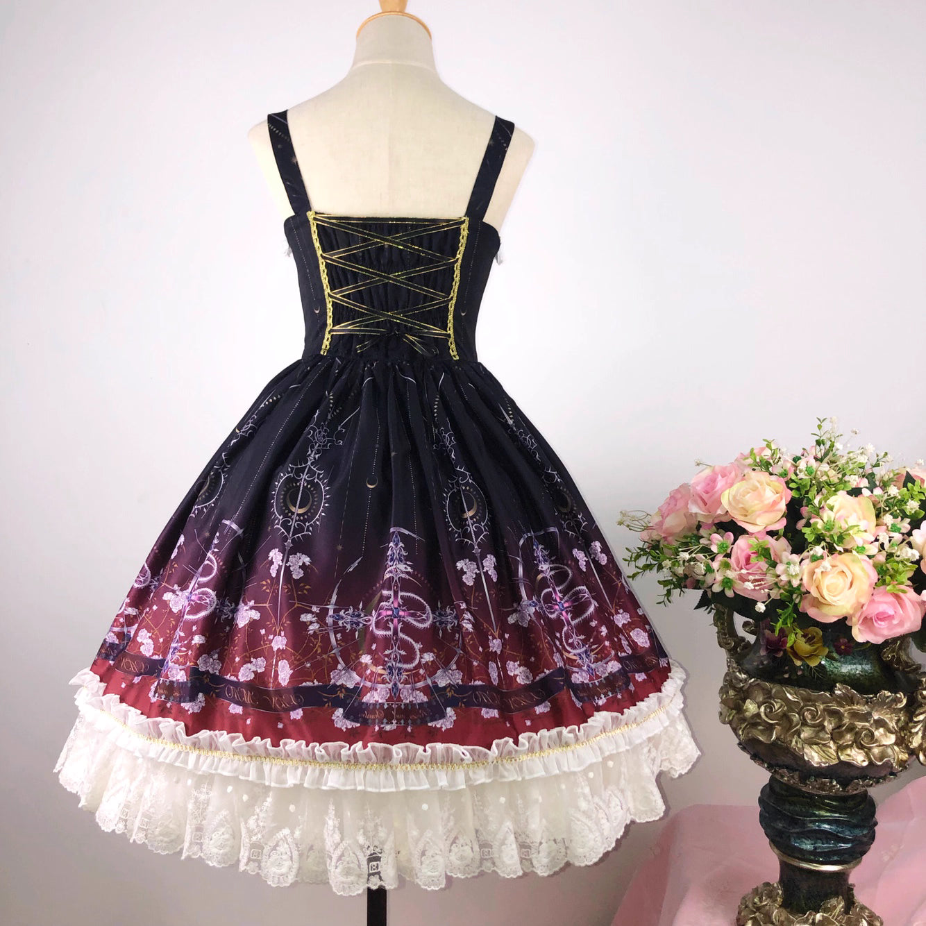 Design Concept:
Inspired by the duality of modern femininity, this dress merges classic Lolita elegance with contemporary sophistication. The structured sweetheart bodice and voluminous skirt create a timeless silhouette, while the off-shoulder neckline adds a touch of delicate allure. Crafted in luxurious ivory with intricate lace detailing, it embodies both innocence and refinement. Ideal for moments where fantasy meets reality—perfect for the dreamer who commands grace with quiet confidence.