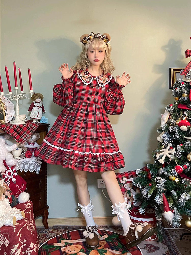 Inspired by festive nostalgia and childhood charm, this dress blends classic Christmas colors with a playful doll collar and soft plaid fabric. The A-line silhouette and delicate details evoke a storybook sweetness, while the cozy construction ensures comfort for holiday gatherings. A delightful piece that captures the magic of the season with timeless innocence and warmth.