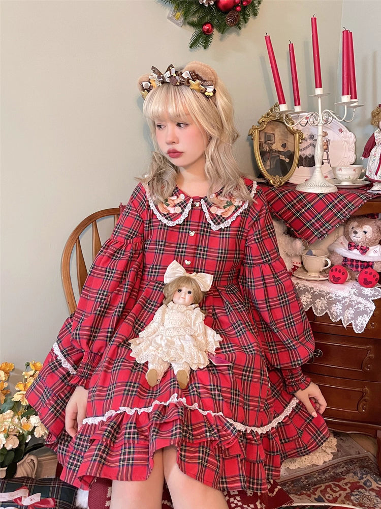 Inspired by festive nostalgia and childhood charm, this dress blends classic Christmas colors with a playful doll collar and soft plaid fabric. The A-line silhouette and delicate details evoke a storybook sweetness, while the cozy construction ensures comfort for holiday gatherings. A delightful piece that captures the magic of the season with timeless innocence and warmth.