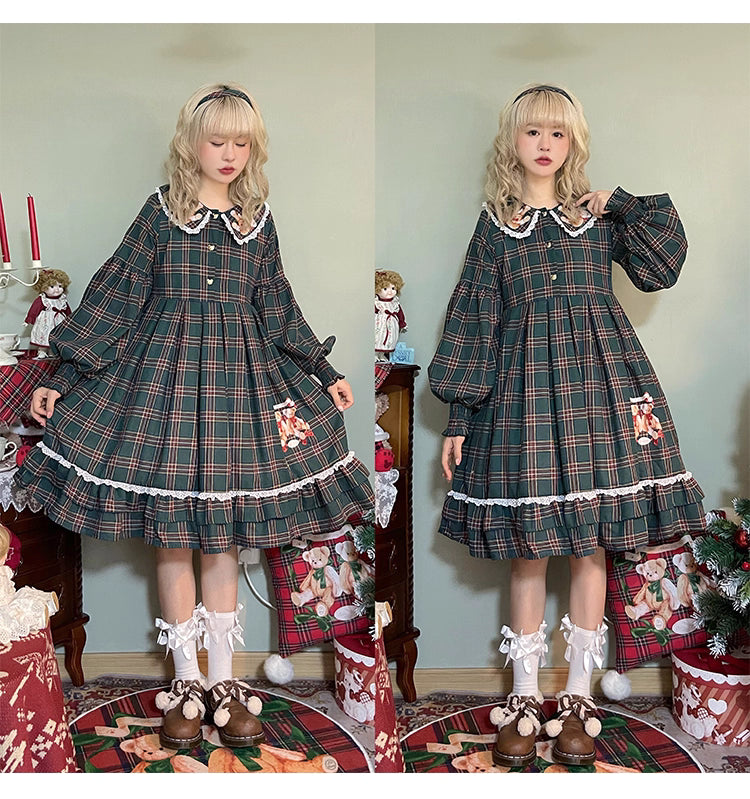 Inspired by festive nostalgia and childhood charm, this dress blends classic Christmas colors with a playful doll collar and soft plaid fabric. The A-line silhouette and delicate details evoke a storybook sweetness, while the cozy construction ensures comfort for holiday gatherings. A delightful piece that captures the magic of the season with timeless innocence and warmth.