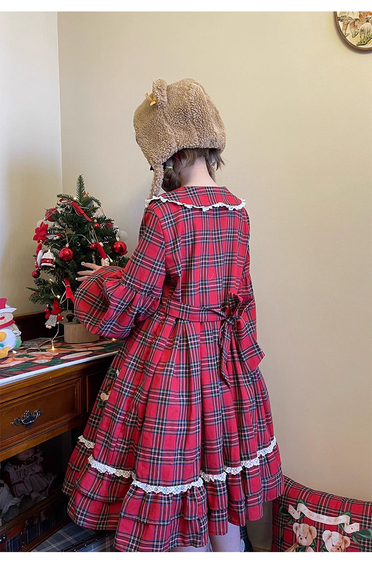 Inspired by festive nostalgia and childhood charm, this dress blends classic Christmas colors with a playful doll collar and soft plaid fabric. The A-line silhouette and delicate details evoke a storybook sweetness, while the cozy construction ensures comfort for holiday gatherings. A delightful piece that captures the magic of the season with timeless innocence and warmth.
