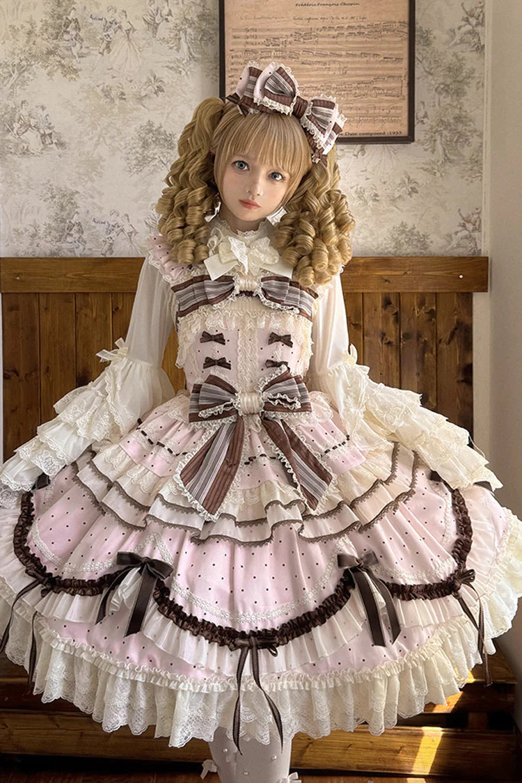 This Pink Sleeveless Sweet Lolita JSK Dress blends youthful sweetness with graceful elegance. Adorned with delicate prints, layered ruffles, and charming bowknot accents, it creates a soft and romantic aesthetic. The lace-up design ensures a flattering fit while enhancing the princess-like silhouette. Crafted in a dreamy pink tone, this dress is perfect for tea parties, gatherings, or photoshoots, offering a timeless Lolita charm that balances playful cuteness with refined sophistication.