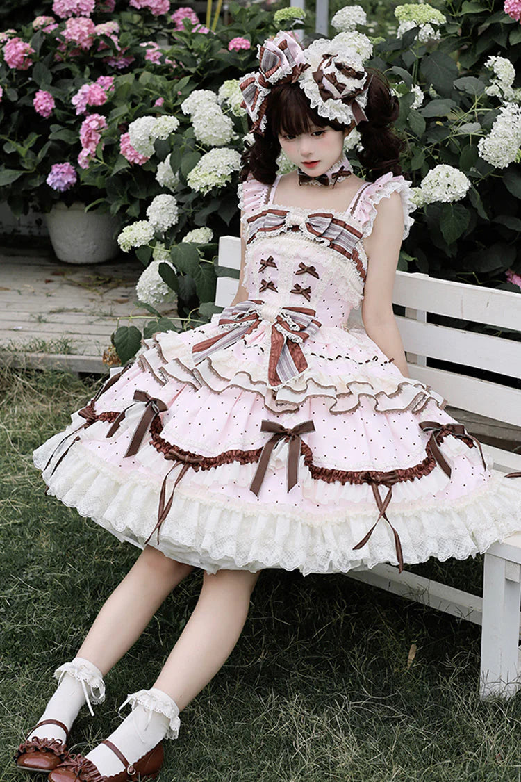 This Pink Sleeveless Sweet Lolita JSK Dress blends youthful sweetness with graceful elegance. Adorned with delicate prints, layered ruffles, and charming bowknot accents, it creates a soft and romantic aesthetic. The lace-up design ensures a flattering fit while enhancing the princess-like silhouette. Crafted in a dreamy pink tone, this dress is perfect for tea parties, gatherings, or photoshoots, offering a timeless Lolita charm that balances playful cuteness with refined sophistication.