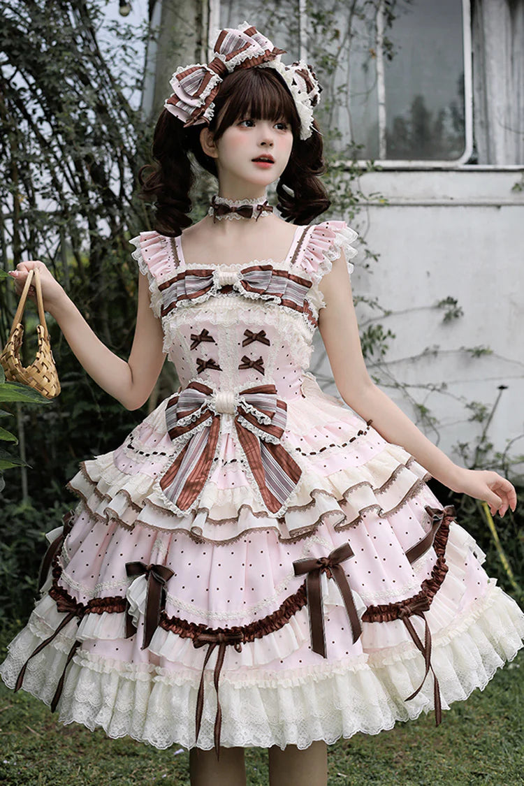 This Pink Sleeveless Sweet Lolita JSK Dress blends youthful sweetness with graceful elegance. Adorned with delicate prints, layered ruffles, and charming bowknot accents, it creates a soft and romantic aesthetic. The lace-up design ensures a flattering fit while enhancing the princess-like silhouette. Crafted in a dreamy pink tone, this dress is perfect for tea parties, gatherings, or photoshoots, offering a timeless Lolita charm that balances playful cuteness with refined sophistication.