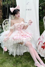 Indulge in sweet charm with this adorable lolita dress set! The off-shoulder neckline and sleeveless design showcase delicate lace and ruffled details, while a playful strawberry print adds a delightful touch. A elegant bowknot accents the bust, enhancing the princess-style silhouette. Perfect for tea parties, cosplay events, or creating a dreamy daily look, this set brings a whimsical and romantic vibe to your wardrobe.