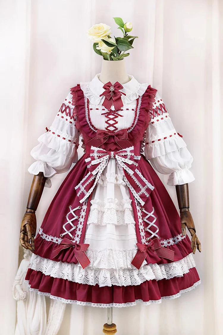 This Red White Sweet Lolita JSK Dress features a charming sleeveless design paired with a delicate cardigan for versatile layering. Multi layered ruffles and lace trims create a soft voluminous silhouette while bowknot details enhance its playful sweetness. The bold red and pure white contrast offers a festive yet elegant look making it perfect for tea parties holiday gatherings or themed occasions. Designed for comfort and style this set captures the essence of youthful Lolita fashion with timeless charm.