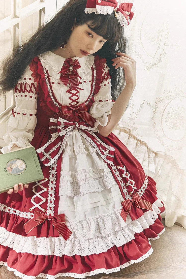 This Red White Sweet Lolita JSK Dress features a charming sleeveless design paired with a delicate cardigan for versatile layering. Multi layered ruffles and lace trims create a soft voluminous silhouette while bowknot details enhance its playful sweetness. The bold red and pure white contrast offers a festive yet elegant look making it perfect for tea parties holiday gatherings or themed occasions. Designed for comfort and style this set captures the essence of youthful Lolita fashion with timeless charm.