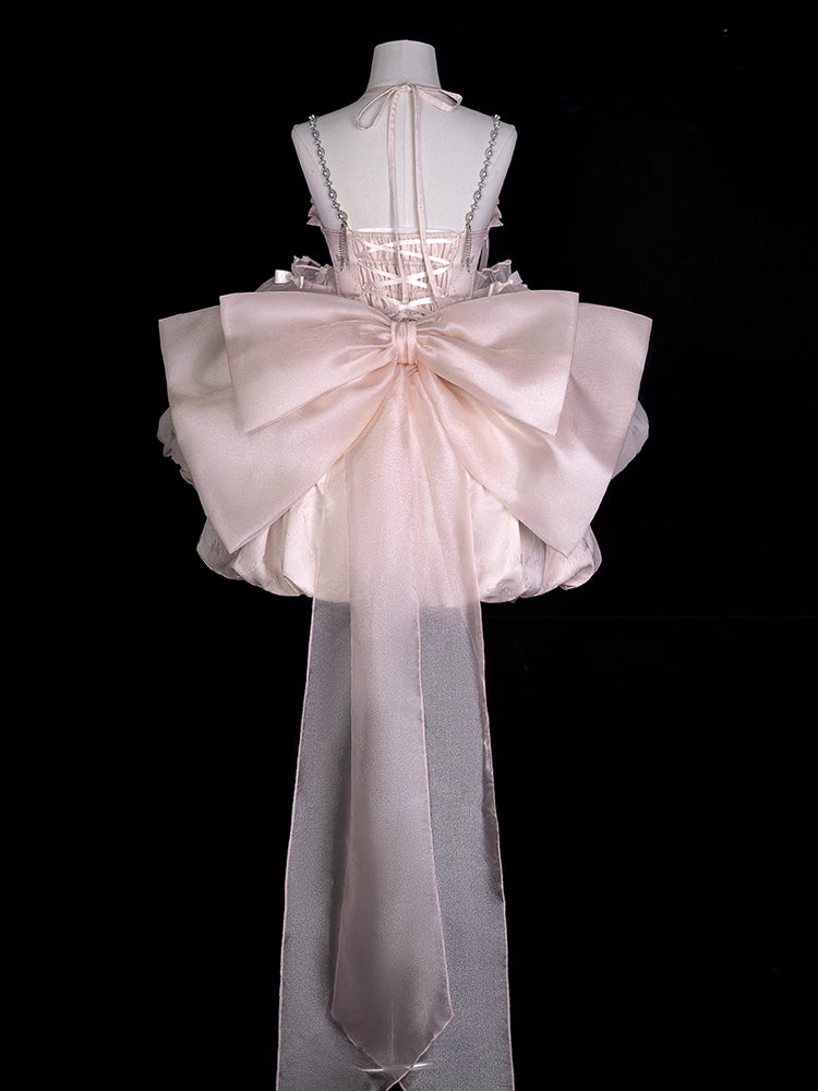 Inspired by fairy-tale escapism, this Lolita dress features a delicate floral print, a structured bustier, and a soft bloom-shaped skirt. The sweet pink palette and intricate lace details evoke romantic fantasy, while the lightweight fabric ensures comfort. Perfect for creating dreamy, whimsical moments.
