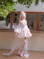 Inspired by fairy-tale escapism, this Lolita dress features a delicate floral print, a structured bustier, and a soft bloom-shaped skirt. The sweet pink palette and intricate lace details evoke romantic fantasy, while the lightweight fabric ensures comfort. Perfect for creating dreamy, whimsical moments.