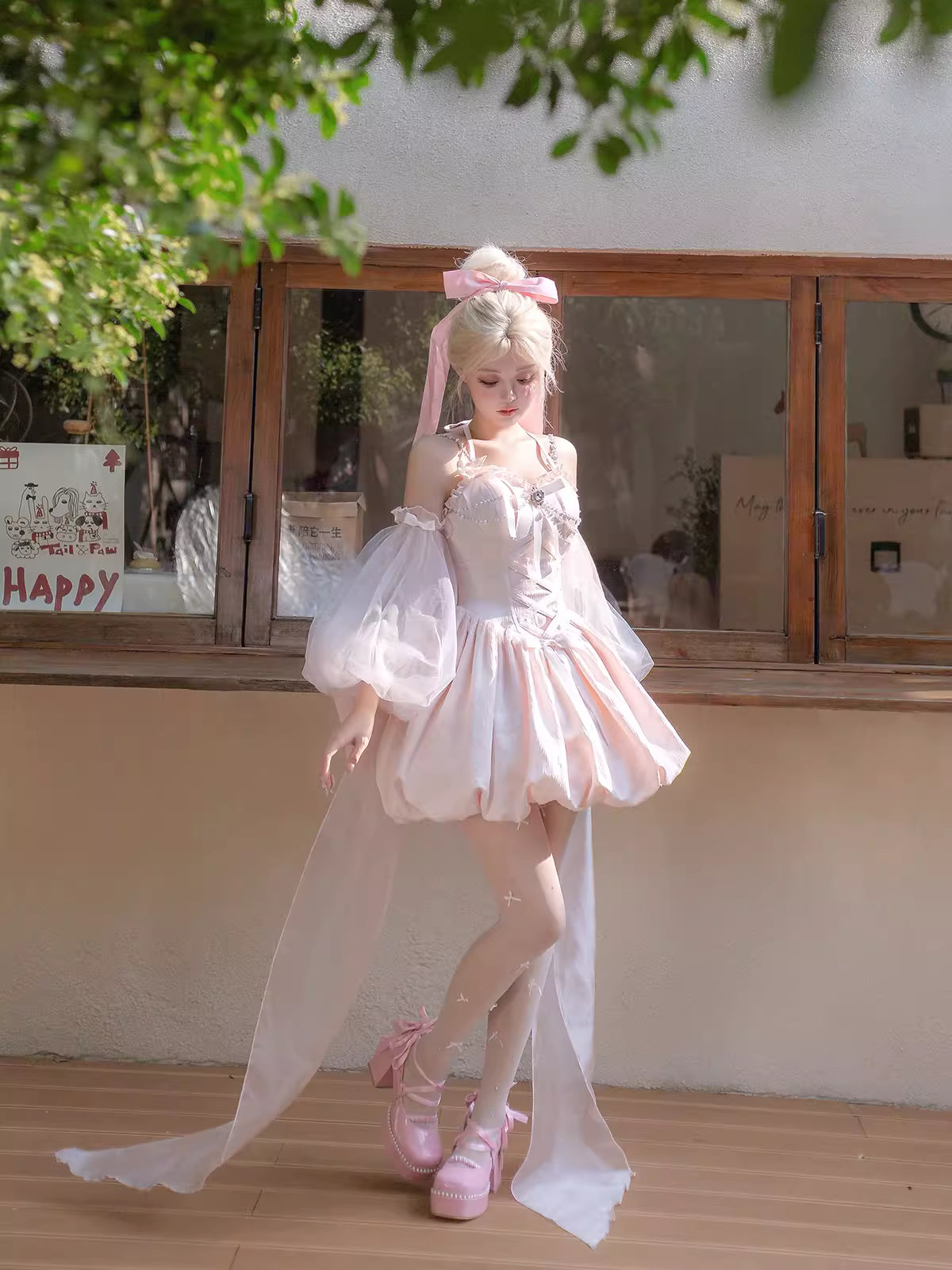 Inspired by fairy-tale escapism, this Lolita dress features a delicate floral print, a structured bustier, and a soft bloom-shaped skirt. The sweet pink palette and intricate lace details evoke romantic fantasy, while the lightweight fabric ensures comfort. Perfect for creating dreamy, whimsical moments.