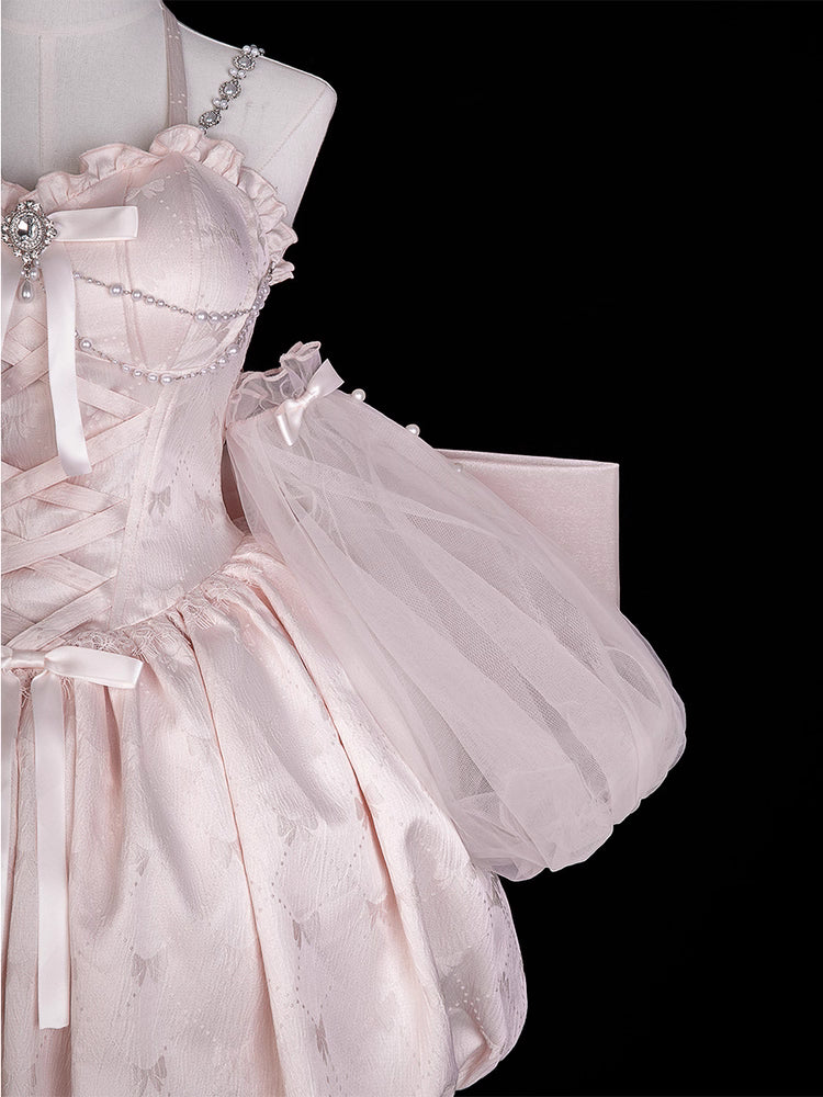 Inspired by fairy-tale escapism, this Lolita dress features a delicate floral print, a structured bustier, and a soft bloom-shaped skirt. The sweet pink palette and intricate lace details evoke romantic fantasy, while the lightweight fabric ensures comfort. Perfect for creating dreamy, whimsical moments.