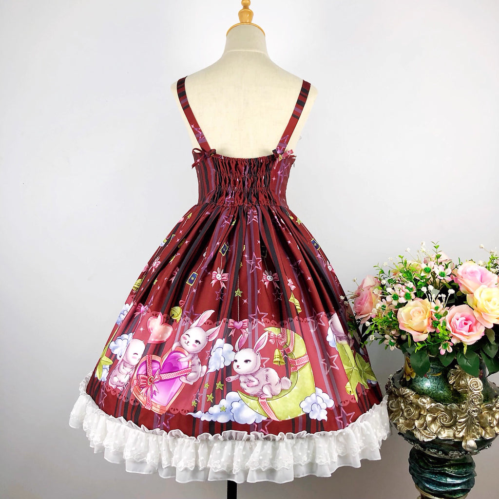 Inspired by a celestial carnival, this "Star Paradise" JSK features vibrant red printed fabric and playful bow accents. The strapless design and A-line silhouette offer a flattering fit for daily wear. Sweet yet versatile, it combines whimsical charm with wearable elegance, perfect for creating joyful coordinates that capture the magic of a starlit fantasy.