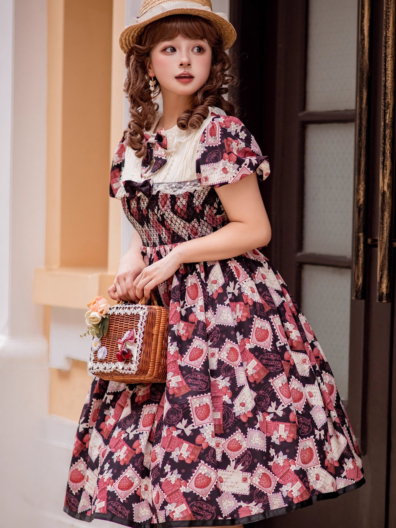 Enchanted by rustic witchcraft and sweet folklore, this black dress blooms with delicate strawberry embroidery and whimsical prints. The sleeveless design and lightweight cotton ensure cool comfort for summer, while layered ruffles and a fitted waist balance playful charm with elegant structure. A spellbinding piece that captures the magic of sun-ripened berries and pastoral daydreams.