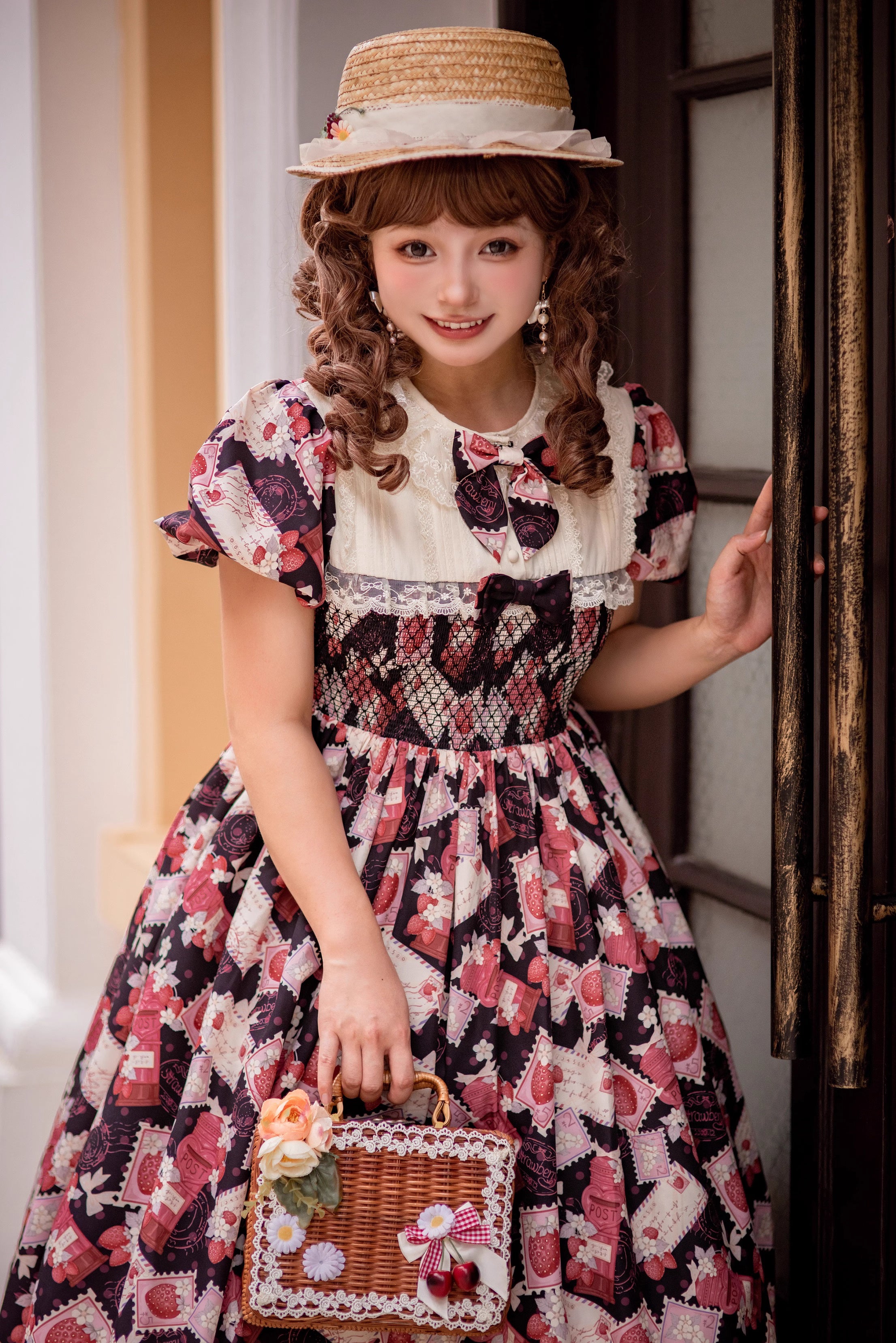 Enchanted by rustic witchcraft and sweet folklore, this black dress blooms with delicate strawberry embroidery and whimsical prints. The sleeveless design and lightweight cotton ensure cool comfort for summer, while layered ruffles and a fitted waist balance playful charm with elegant structure. A spellbinding piece that captures the magic of sun-ripened berries and pastoral daydreams.
