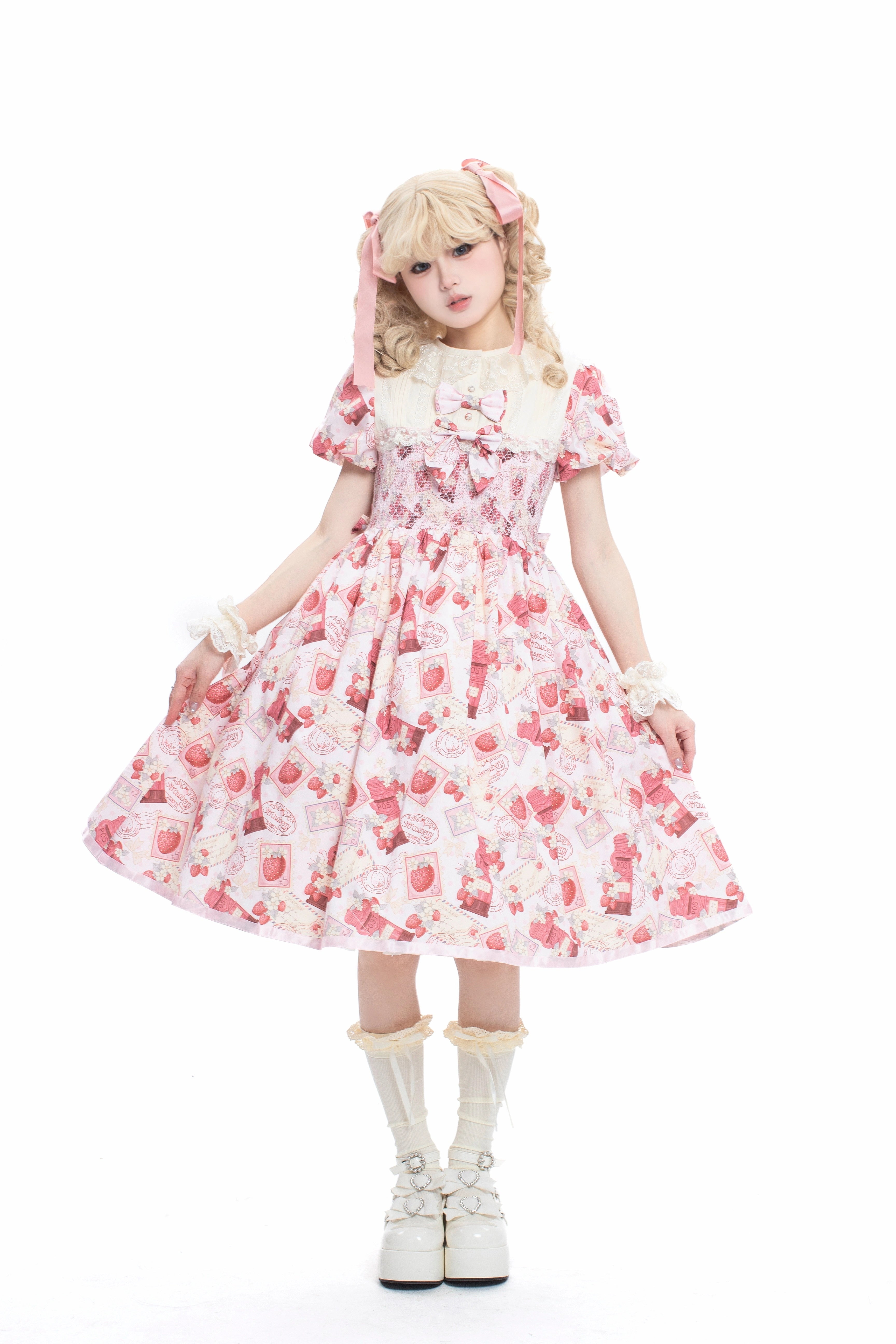 Enchanted by rustic witchcraft and sweet folklore, this pink dress blooms with delicate strawberry embroidery and whimsical prints. The sleeveless design and lightweight cotton ensure cool comfort for summer, while layered ruffles and a fitted waist balance playful charm with elegant structure. A spellbinding piece that captures the magic of sun-ripened berries and pastoral daydreams.