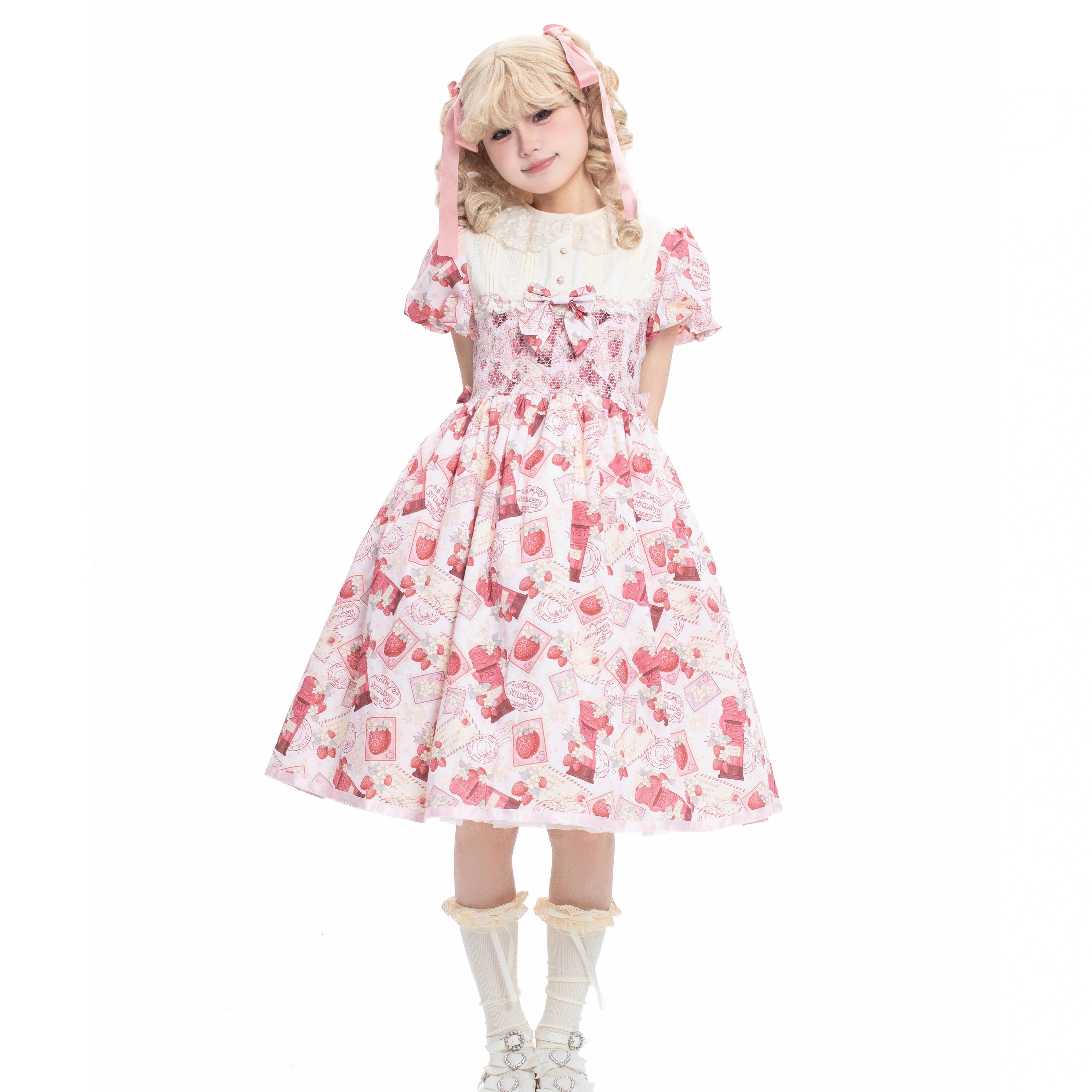 Enchanted by rustic witchcraft and sweet folklore, this pink dress blooms with delicate strawberry embroidery and whimsical prints. The sleeveless design and lightweight cotton ensure cool comfort for summer, while layered ruffles and a fitted waist balance playful charm with elegant structure. A spellbinding piece that captures the magic of sun-ripened berries and pastoral daydreams.