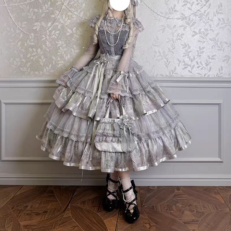 Enter a realm of opulent fantasy with the Twin Bears Gilded Dream skirt, where artistry meets elegance. This original design features exquisite golden embroidery shimmering against a luxurious fabric backdrop, evoking the magic of a twilight dream. The A-line silhouette flows gracefully, adorned with intricate details that catch the light with every movement. Perfect for enchanting tea parties, romantic gatherings, or adding a touch of grandeur to daily wear. Each stitch tells a story of craftsmanship and w