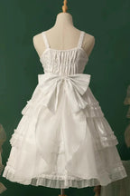 The Wedding Lolita White Starry Romance JSK Dress is created to blend bridal elegance with the dreamy sweetness of Lolita fashion. Crafted in pure white, it features multi-layered ruffles, graceful bow accents, and subtle starry details that evoke a fairytale atmosphere. The princess silhouette conveys both purity and sophistication, making it perfect for special ceremonies, photoshoots, or romantic occasions. Designed to capture timeless beauty, it offers a harmonious balance of sweetness, refinement, and 