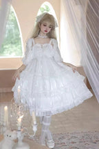 The Wedding Lolita White Starry Romance JSK Dress is created to blend bridal elegance with the dreamy sweetness of Lolita fashion. Crafted in pure white, it features multi-layered ruffles, graceful bow accents, and subtle starry details that evoke a fairytale atmosphere. The princess silhouette conveys both purity and sophistication, making it perfect for special ceremonies, photoshoots, or romantic occasions. Designed to capture timeless beauty, it offers a harmonious balance of sweetness, refinement, and 