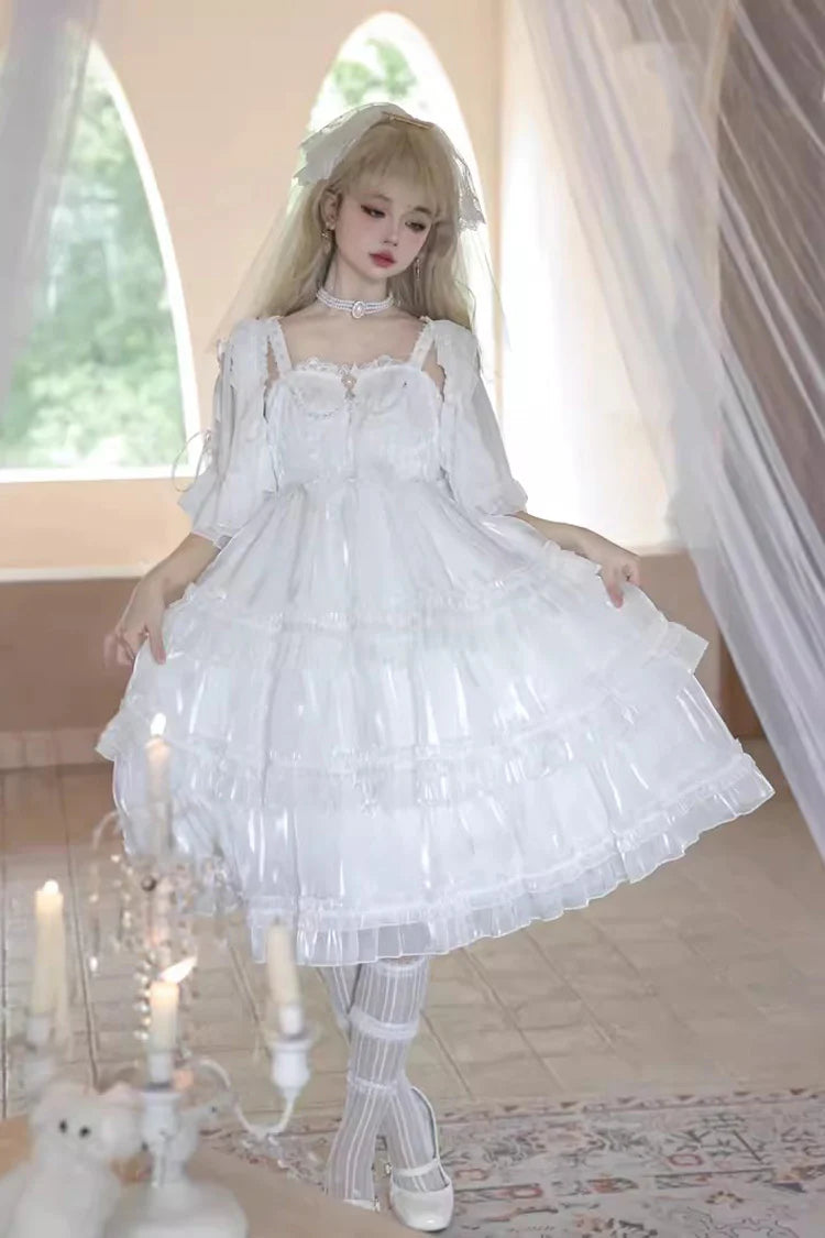 The Wedding Lolita White Starry Romance JSK Dress is created to blend bridal elegance with the dreamy sweetness of Lolita fashion. Crafted in pure white, it features multi-layered ruffles, graceful bow accents, and subtle starry details that evoke a fairytale atmosphere. The princess silhouette conveys both purity and sophistication, making it perfect for special ceremonies, photoshoots, or romantic occasions. Designed to capture timeless beauty, it offers a harmonious balance of sweetness, refinement, and 