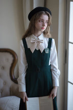 Design Concept:

This Academic Department green pullover dress set blends sweet school style with elegant Lolita elements, presenting a refined and youthful look. The design captures the charm of academic fashion while maintaining a graceful silhouette. The product includes a dress, a matching bow tie, a badge, and a chain, creating a complete coordinated outfit.