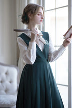 Design Concept:

This Academic Department green pullover dress set blends sweet school style with elegant Lolita elements, presenting a refined and youthful look. The design captures the charm of academic fashion while maintaining a graceful silhouette. The product includes a dress, a matching bow tie, a badge, and a chain, creating a complete coordinated outfit.