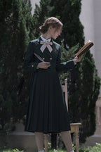 Design Concept:

This Academic Department green pullover dress set blends sweet school style with elegant Lolita elements, presenting a refined and youthful look. The design captures the charm of academic fashion while maintaining a graceful silhouette. The product includes a dress, a matching bow tie, a badge, and a chain, creating a complete coordinated outfit.
