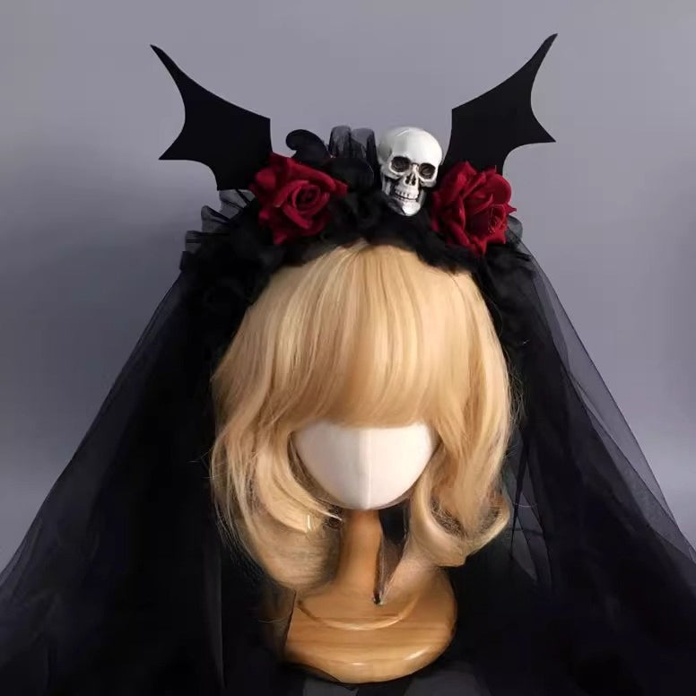 Design Concept：
This Gothic Lolita headband combines elegance and dark charm, featuring a black lace veil attached to a structured headband adorned with intricate black roses. The delicate lace drapes gracefully, creating a mysterious yet refined aesthetic. Perfect for adding a touch of gothic elegance to Halloween looks, cosplay, or themed events.